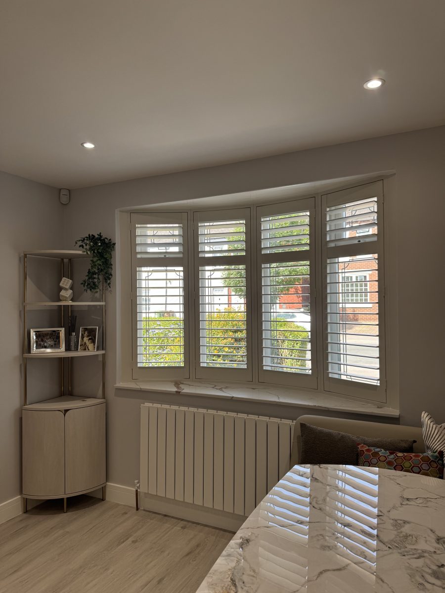 window blinds in a kitchen dining area