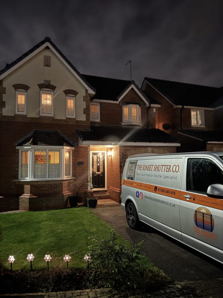 Nighttime view of a suburban house